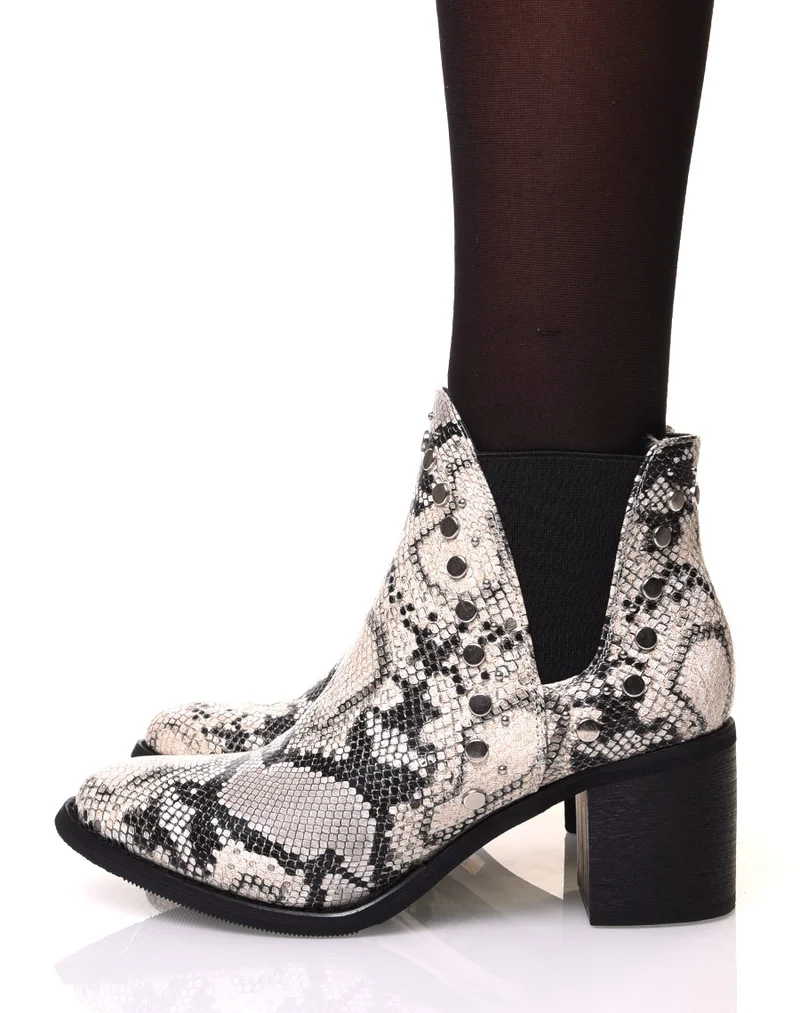 Bottines à talon aux motifs serpent et détails cloutés