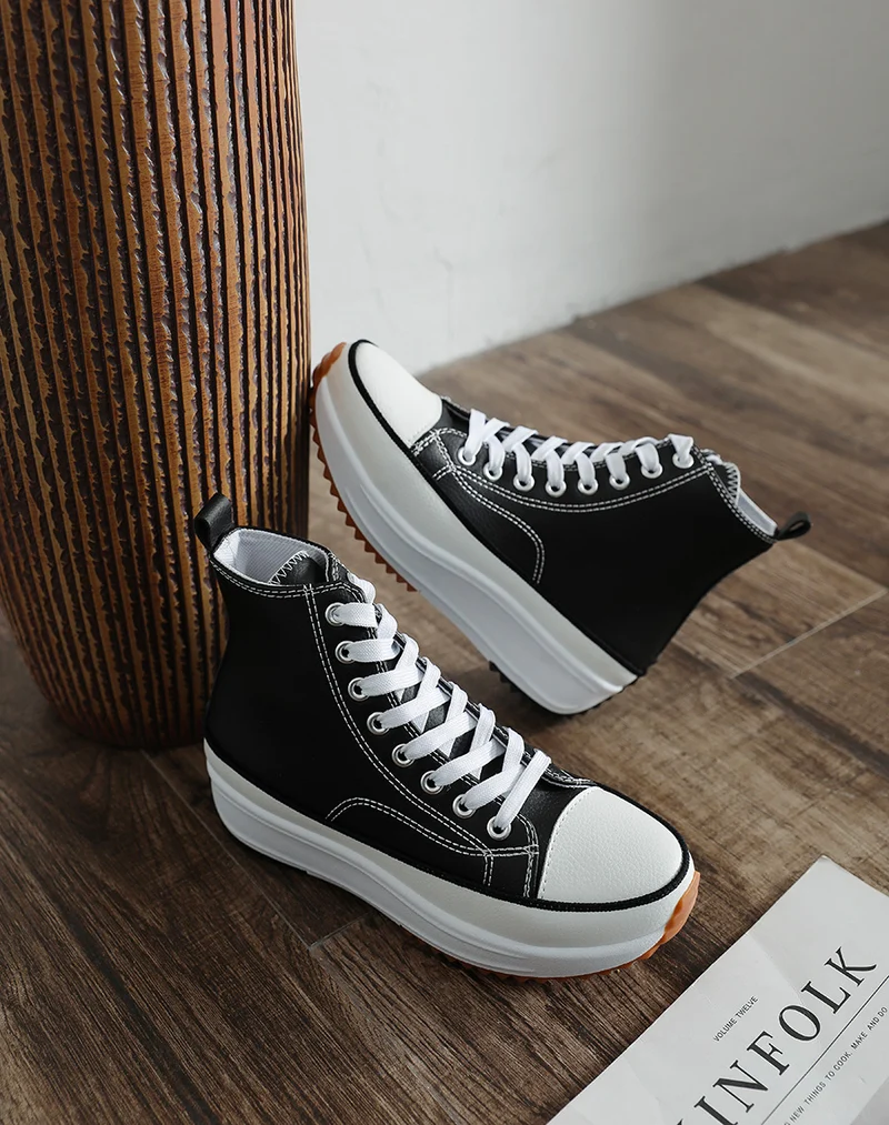 Baskets montantes noires à grosse plateforme