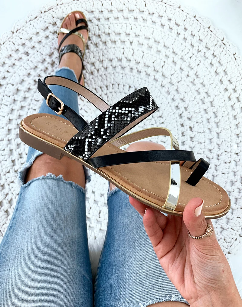 Nu-pieds noires à brides multiples et orteils