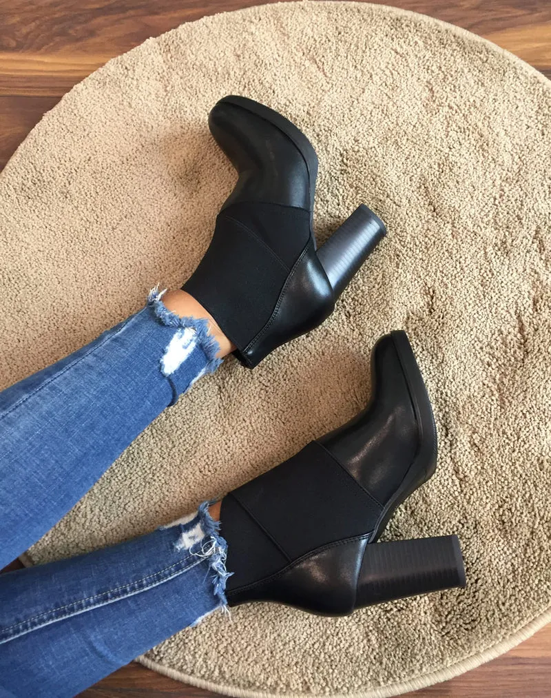 Bottines noires à talons bi matières