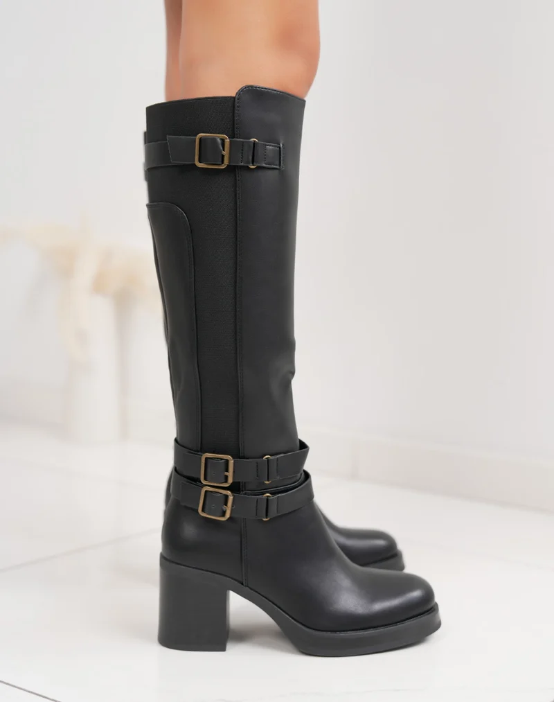 Bottes femme noires fourrées à talon épais, avec boucles dorées et élastique