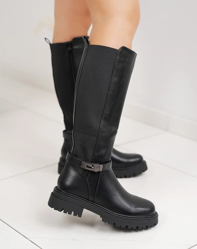 Bottes femme noires fourrées à semelle crantée, élastiquées avec sangle boucle cadenas