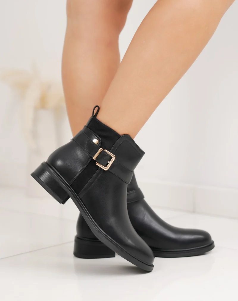 Bottines femme noires bi-matière à petit talon avec boucle dorée élégante