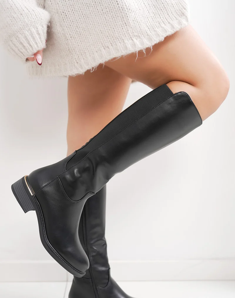 Bottes femme noires cavalières avec élastique et détail doré intérieur fourré