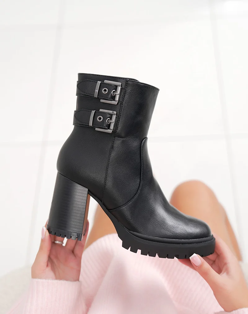 Bottines femme noires à double boucles semelle crantée et intérieur fourré