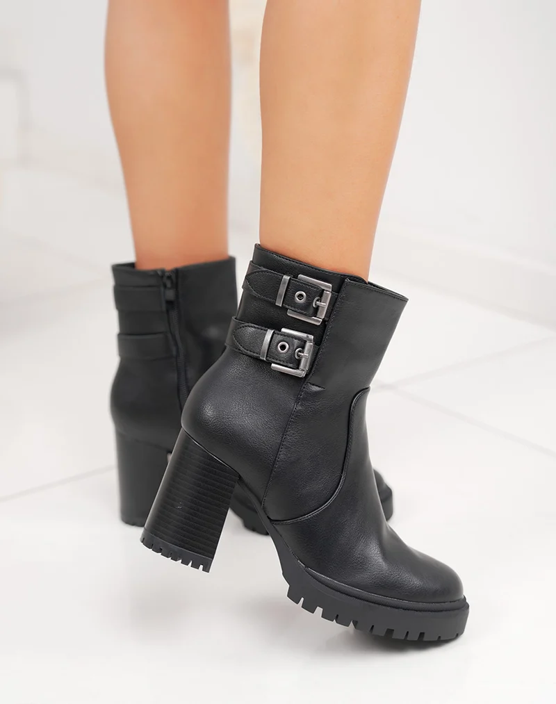 Bottines femme noires à double boucles semelle crantée et intérieur fourré