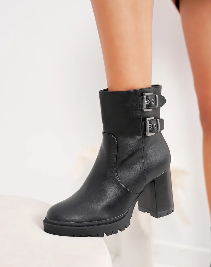 Bottines femme noires à double boucles semelle crantée et intérieur fourré