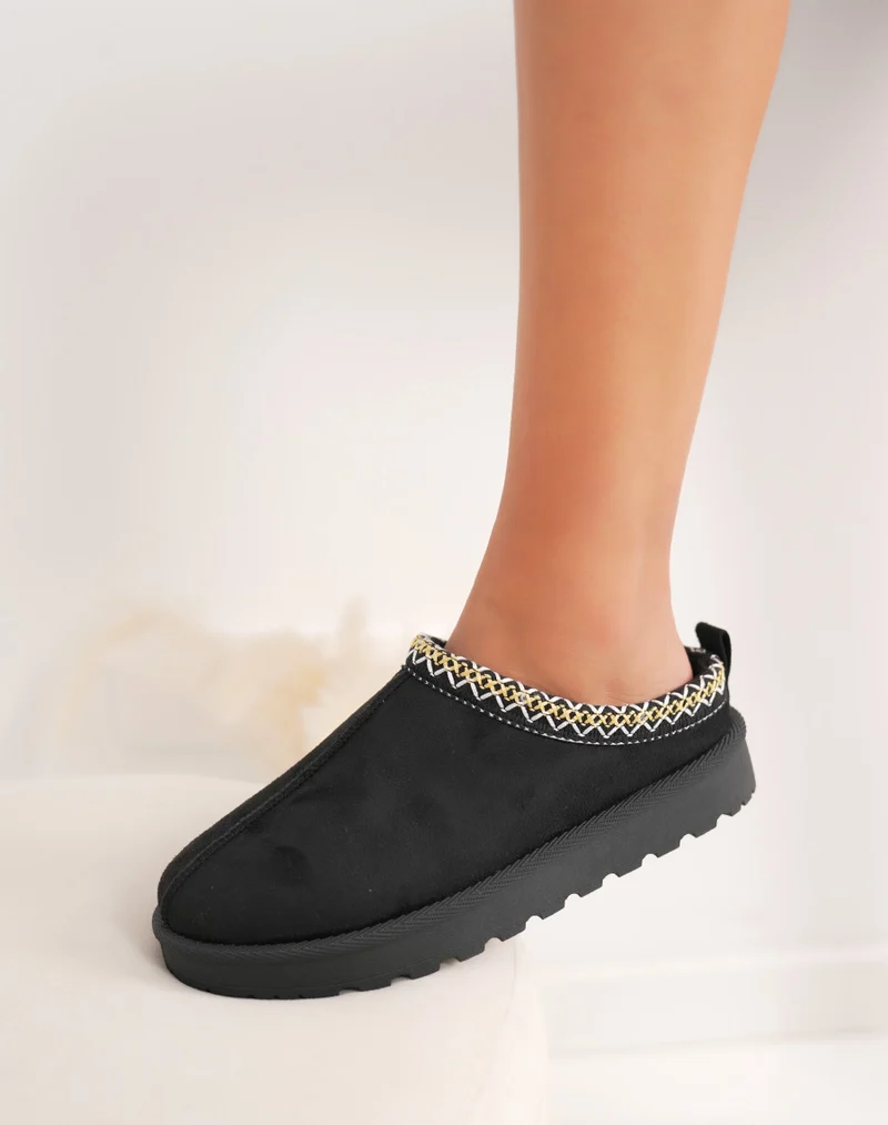 Mules femme noires élégantes en suédine avec liseré rayé et intérieur fourré