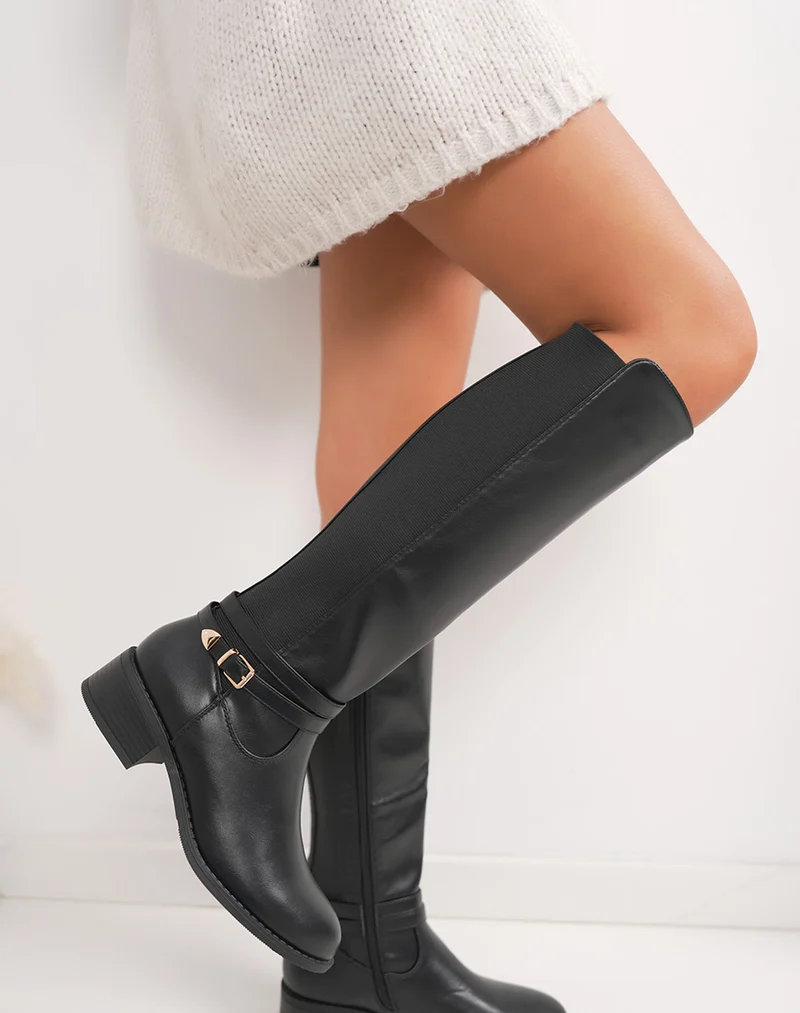 Bottes femme noires à petit talon avec lanière dorée et élastiques latéraux