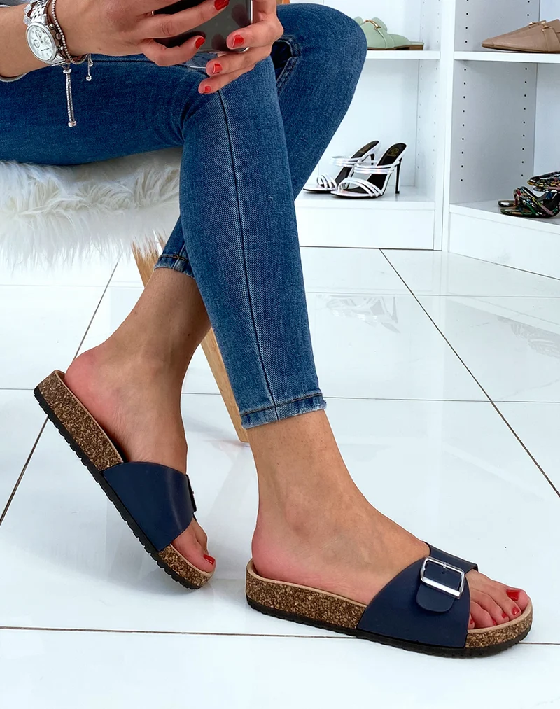 Mules bleus à boucles et à semelles anatomiques