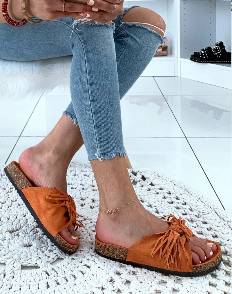 Mules une suédine oranges à larges brides en nœud et à franges