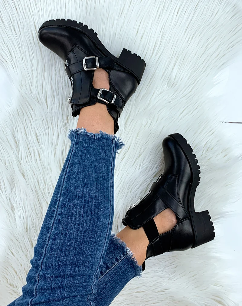 Bottines noires ajourées à sangles et fermetures éclaires