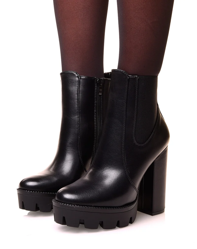 Bottines noires à talons et plateformes crantées