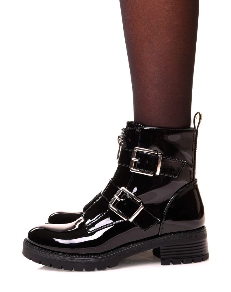 Boots noirs effet vernis à sangles