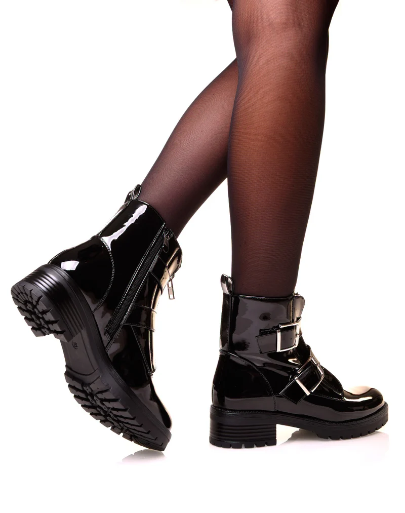 Boots noirs effet vernis à sangles