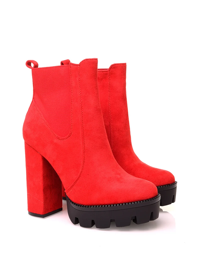 Bottines rouges en suédine à talons et plateformes crantées
