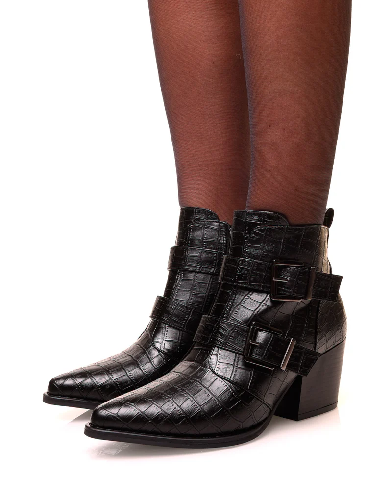 Bottines noires à talons et à effet croco