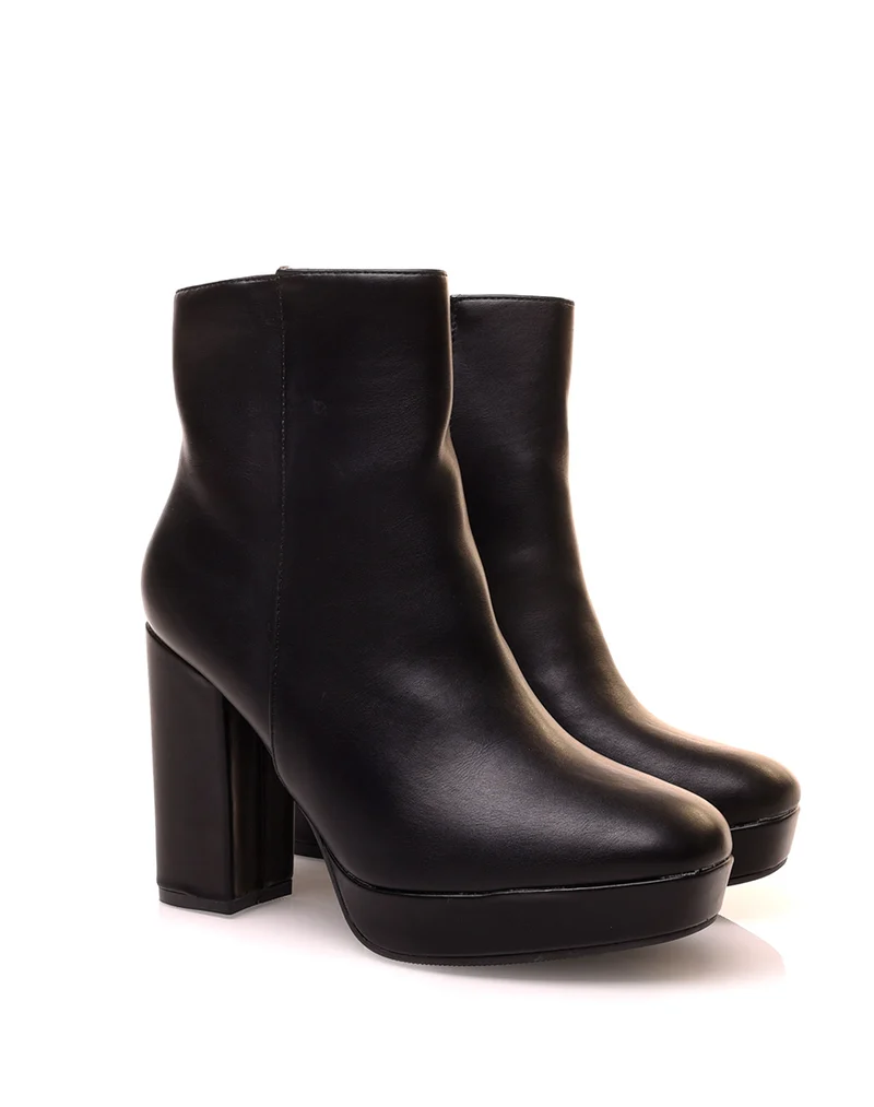 Bottines noires à talon et à grosse plateforme