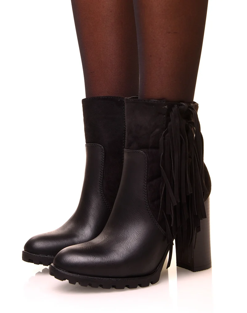 Bottines noires à franges et talons haut