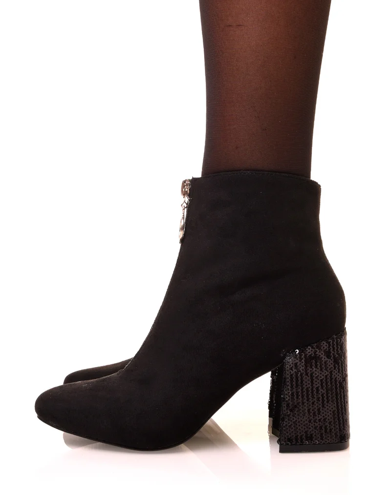 Bottines noires en suédine à talons pailletés