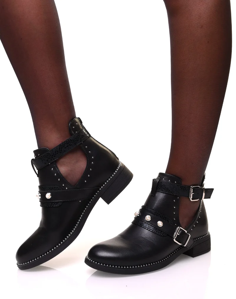 Bottines noires ajourées à sangles effet python