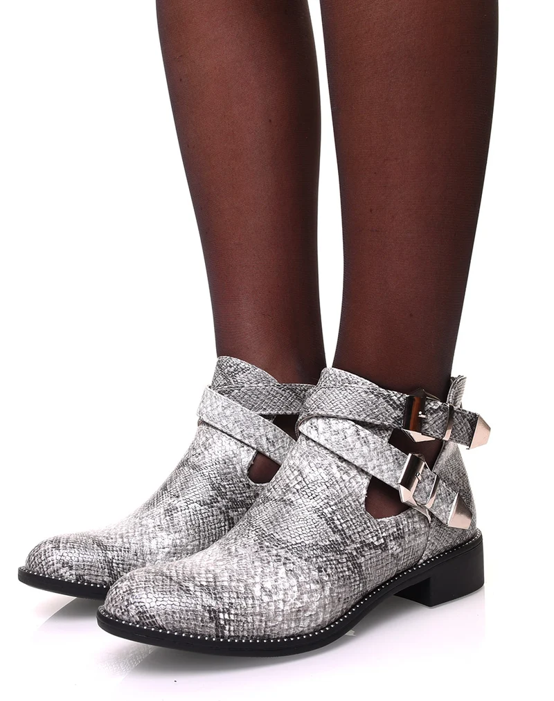 Bottines ajourées effet python perlées de clous sur la semelle