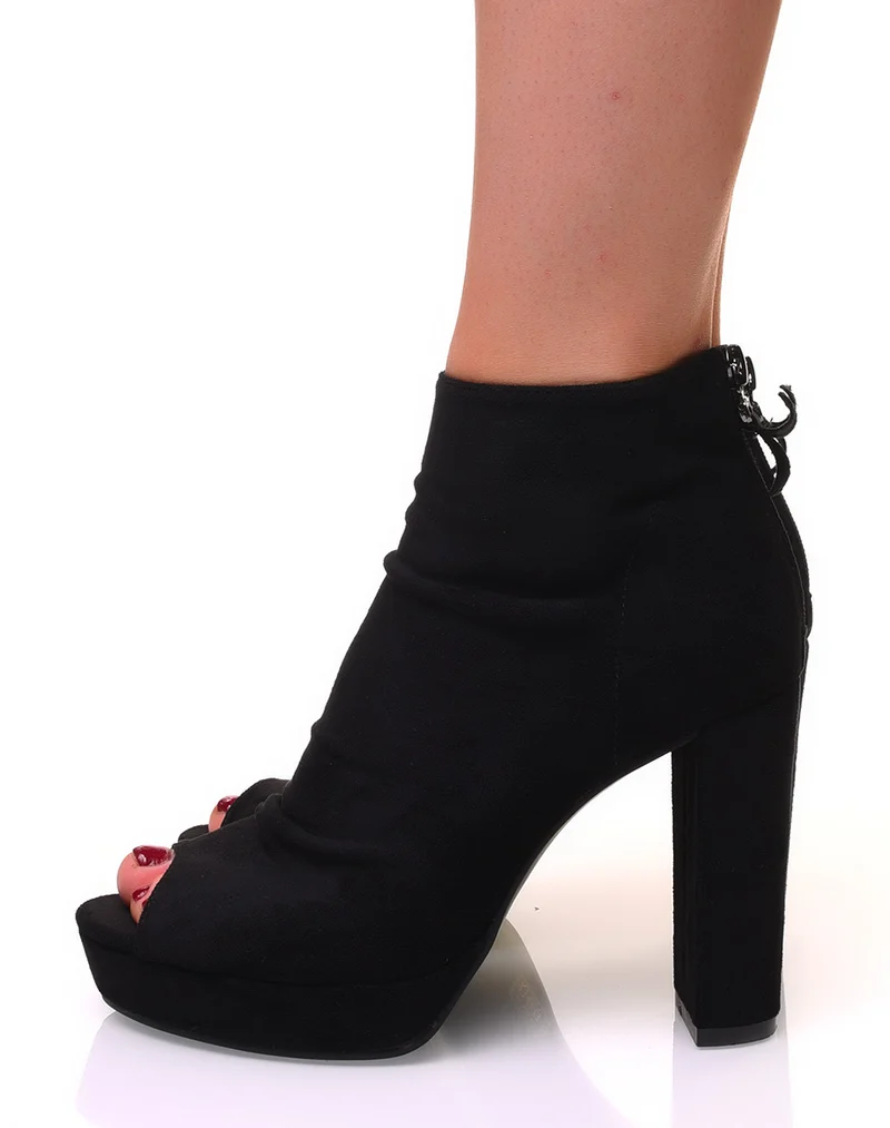 Bottines noires ajourées en suédine à talons carrés