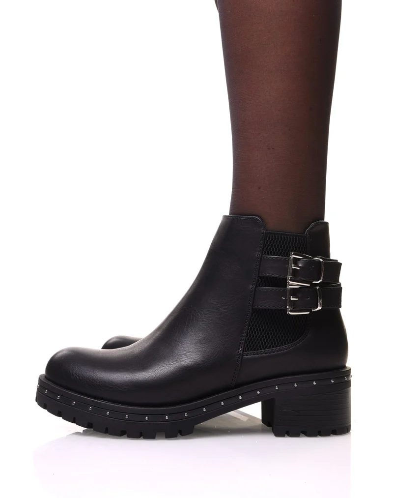Bottines noires à semelle crantée et cloutée