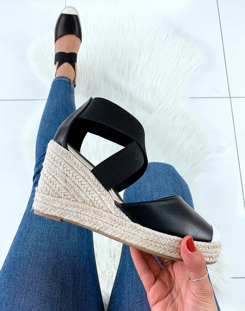 Espadrilles noires à talons compensés et à lanières croisées
