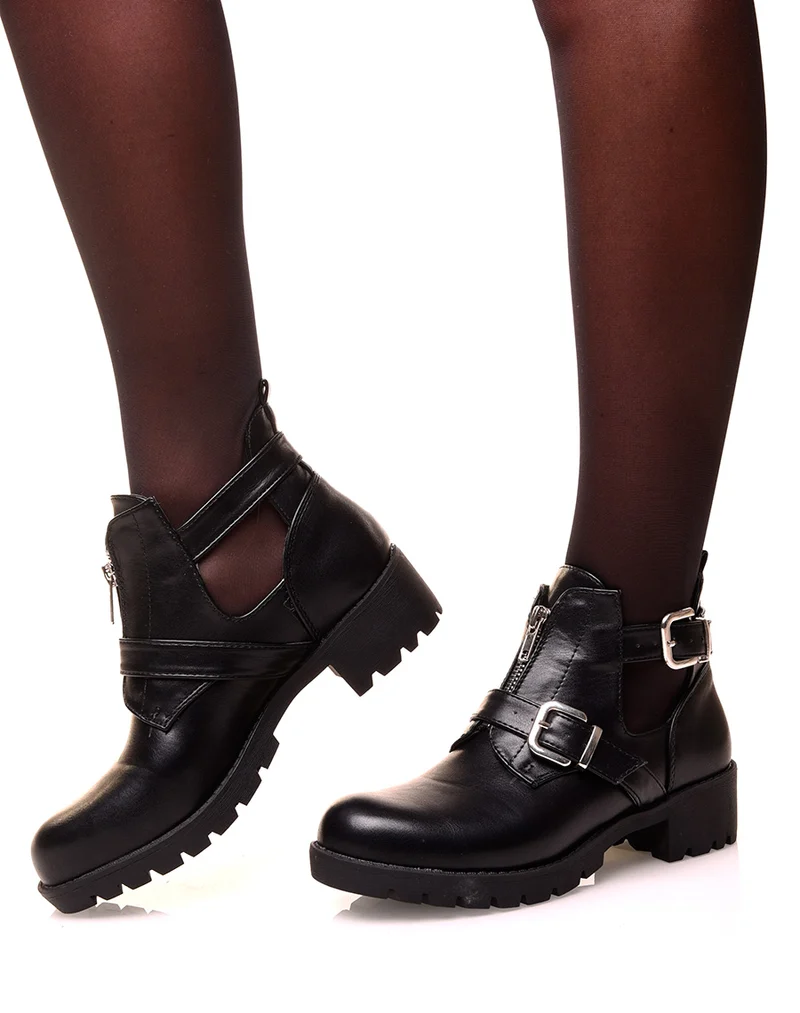 Bottines noires ajourées de sangles et d’un zip