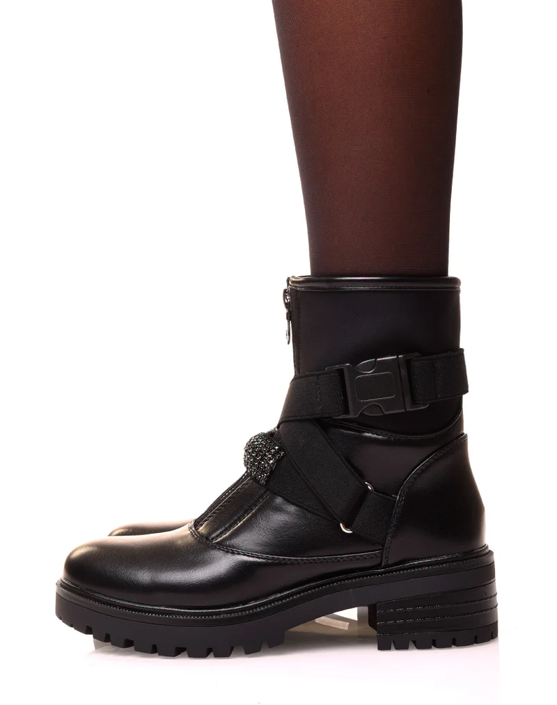 Bottines noires montantes à lanière entrelacé