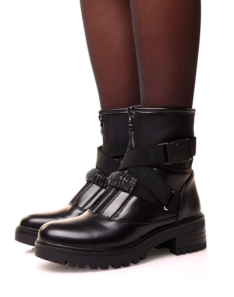 Bottines noires montantes à lanière entrelacé