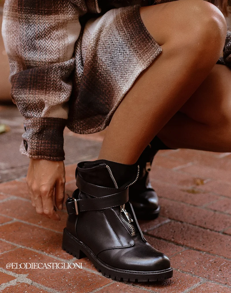 Bottines noires bi matières à sangle entrelacée