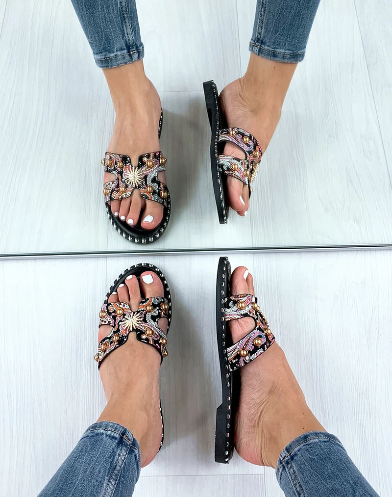Mules noires à ornement