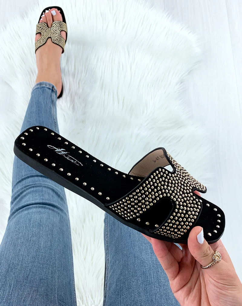 Mules noires cloutées