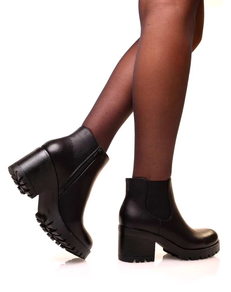 Chelsea boots noires à semelles crantées