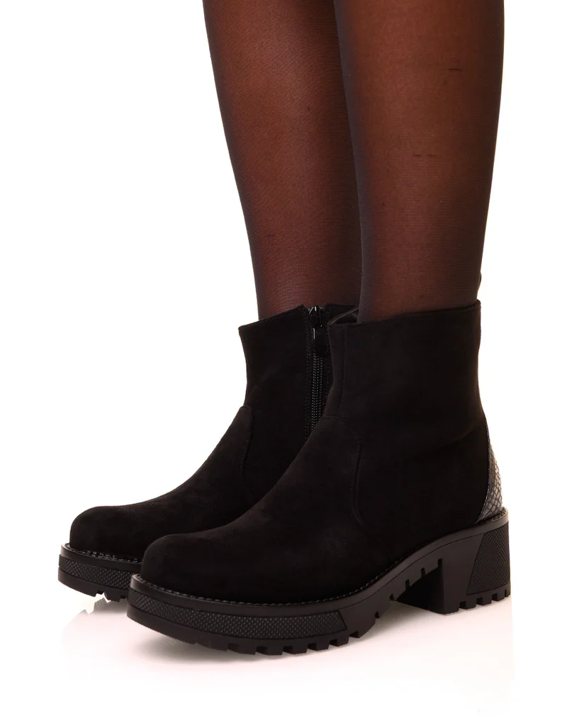 Bottines noires en suédine à talon épais