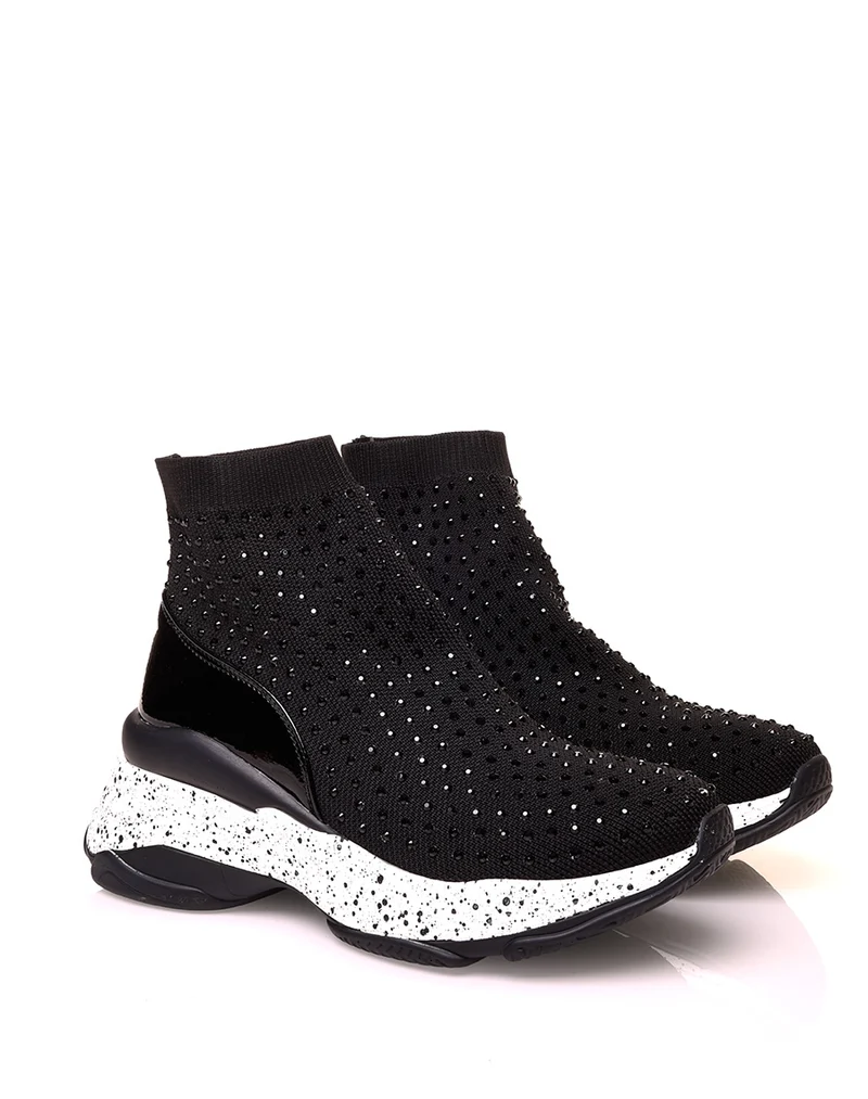 Baskets noires en forme de chaussette à semelles tachetées