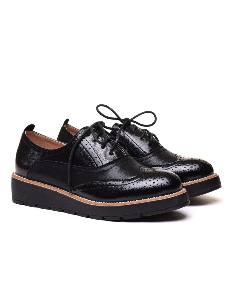 Derbies brillantes noires à semelle compensée
