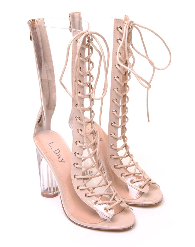 Bottes hautes nudes à talons transparents