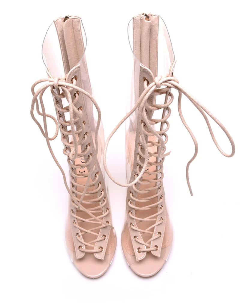 Bottes hautes nudes à talons transparents