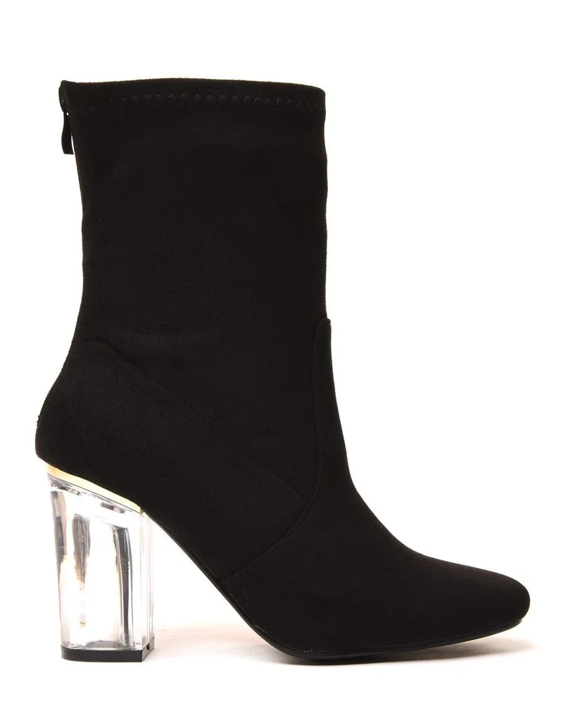 Bottines noires à talon transparent et haut souple