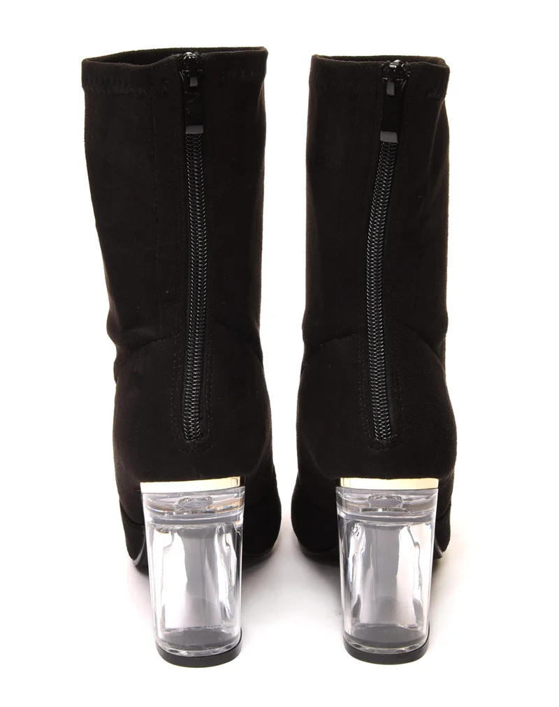 Bottines noires à talon transparent et haut souple