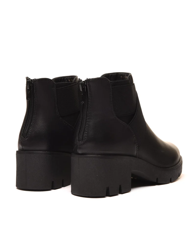 Chelsea boots noires à élastiques croisés