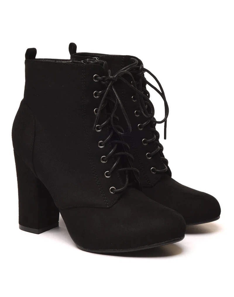 Bottines fourrées noires à talons et lacets