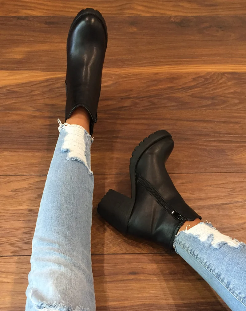 Chelsea boots à talons mi hauts noir