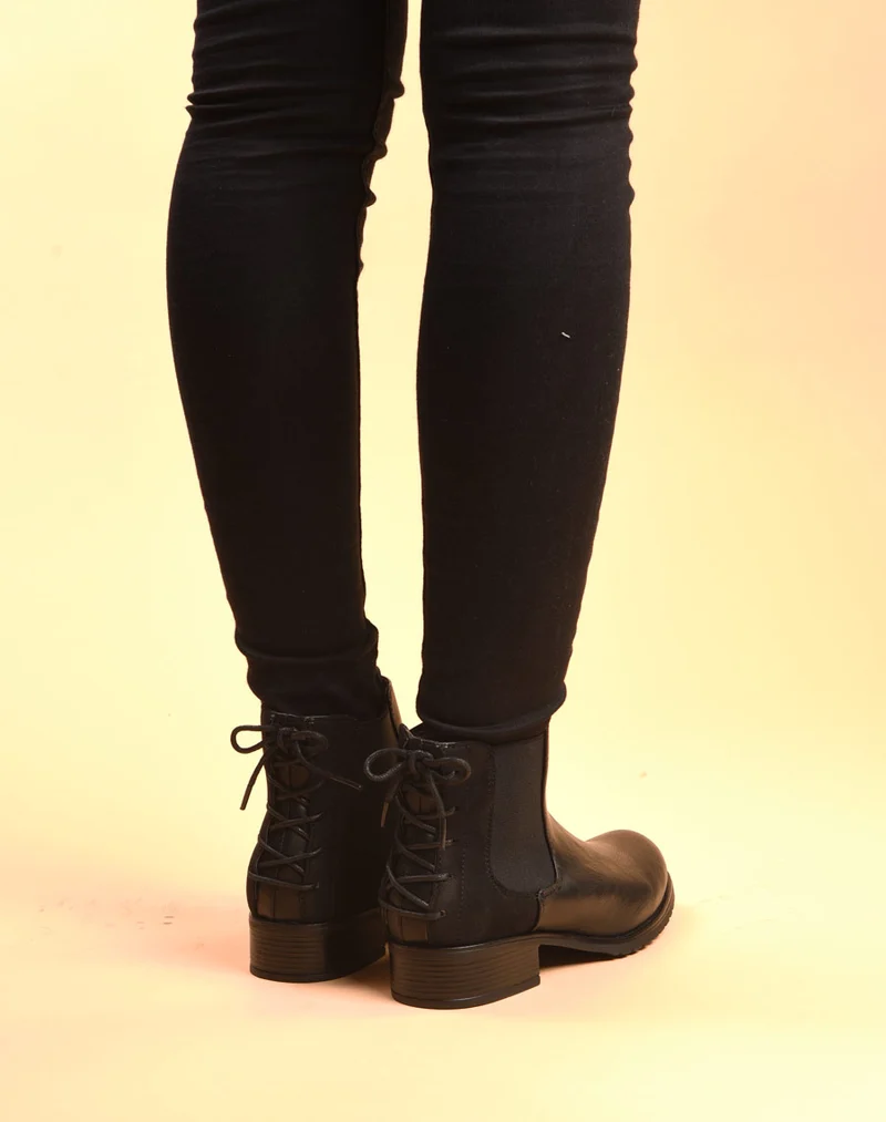 Bottines plates bi matières noires avec lacet décoratif arrière