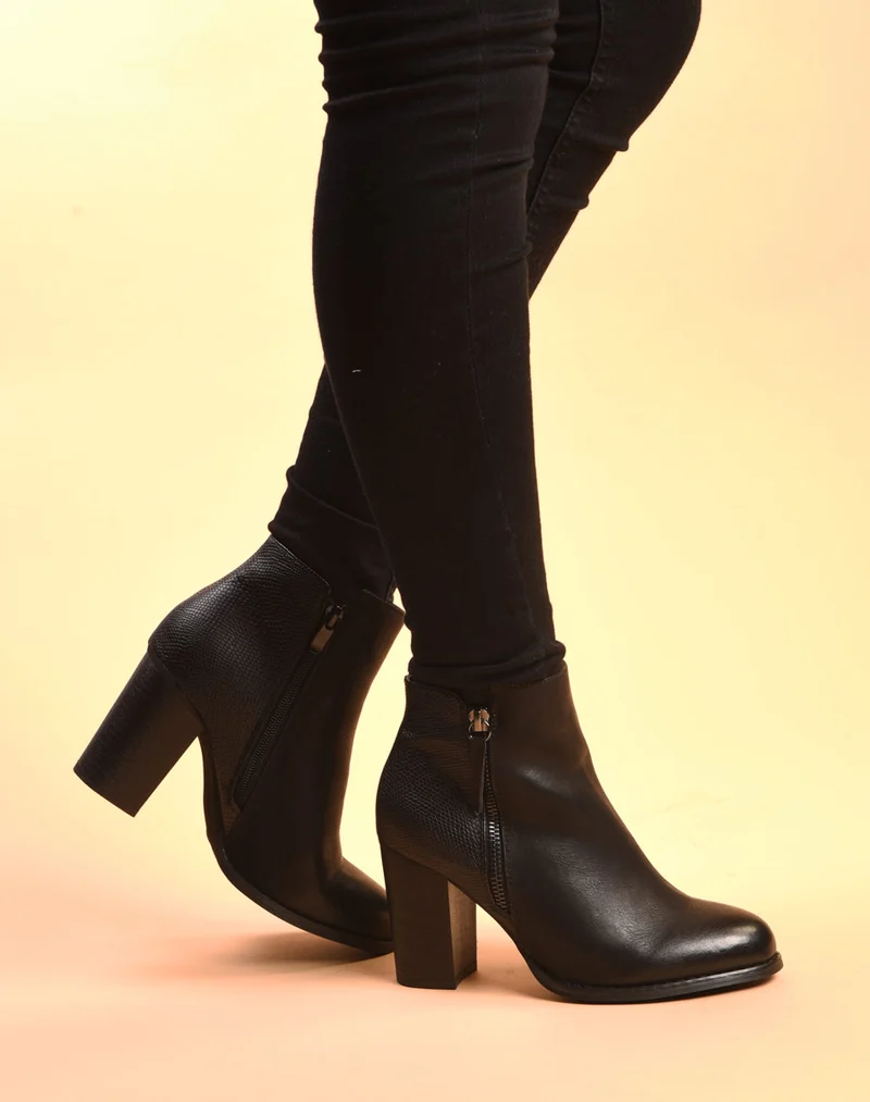 Bottines à talons noires avec motifs python
