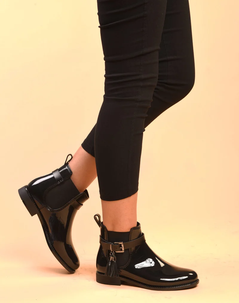 Bottines de pluie noires avec lanière