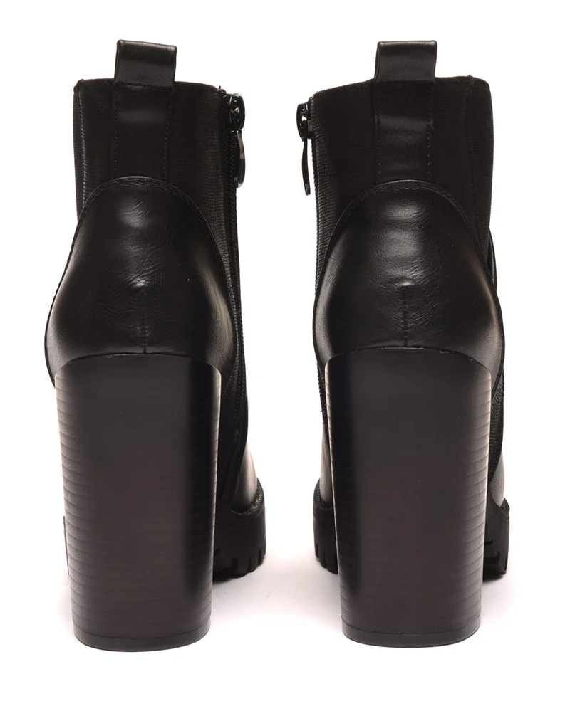 Bottines noires à talons et semelle épaisse